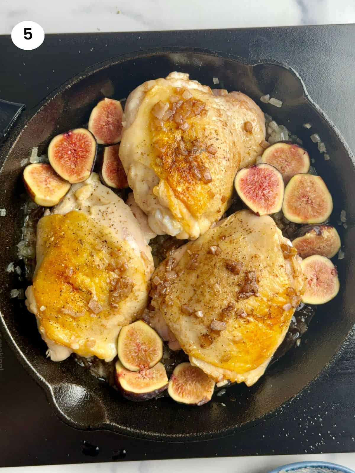 Chicken with figs ready to go in the oven.