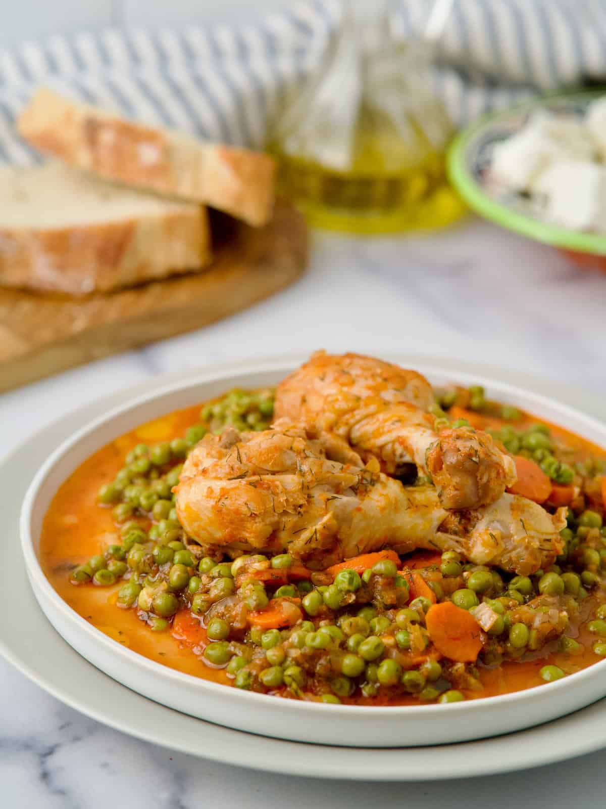 Chicken With Green Peas In Tomato Sauce.