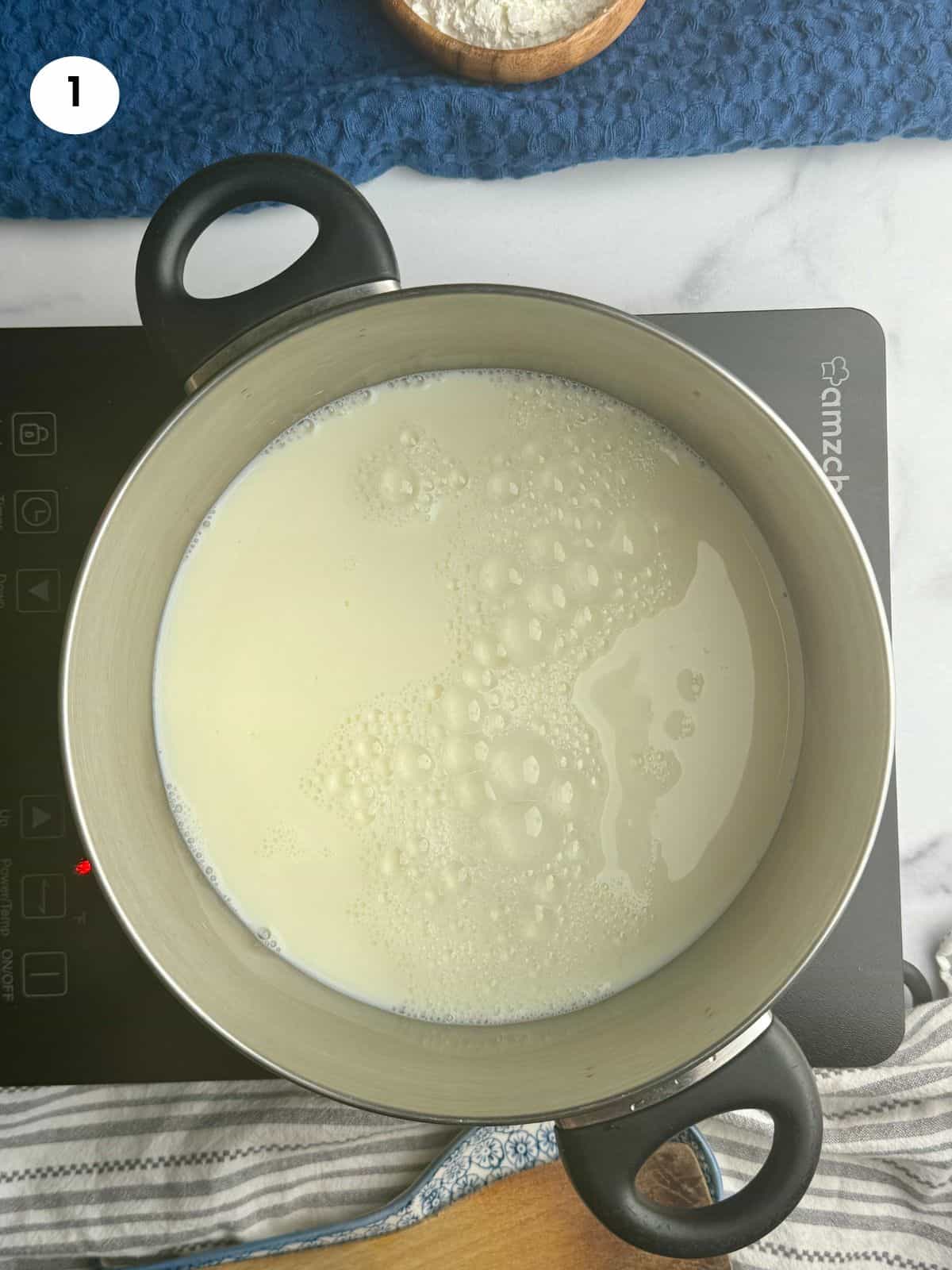 Warming up milk for the cream.