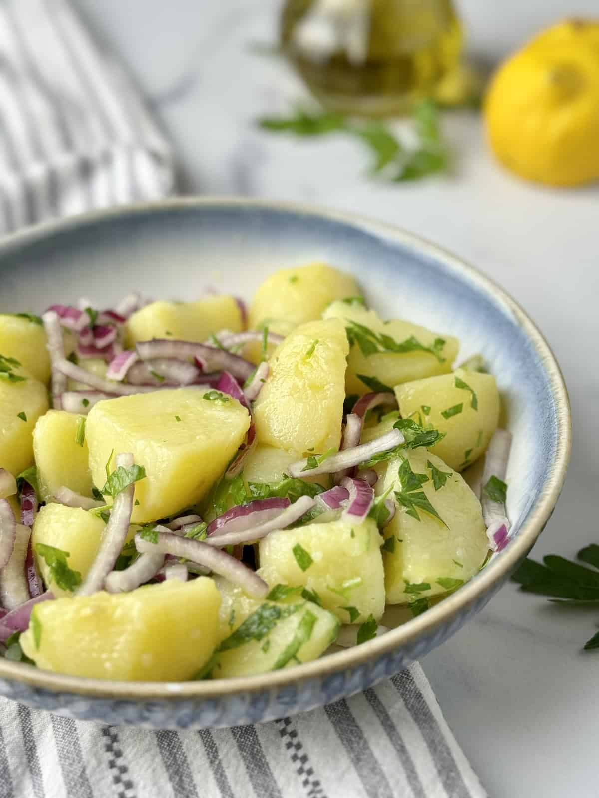 Boiled vlita served in white bowl.