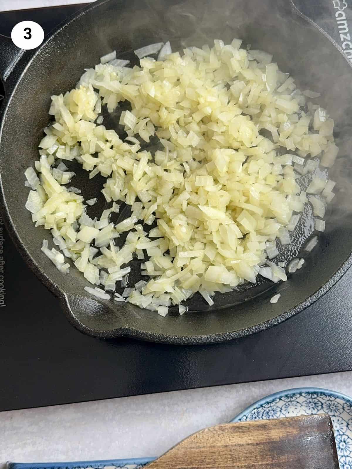 Sauteing the diced onion.