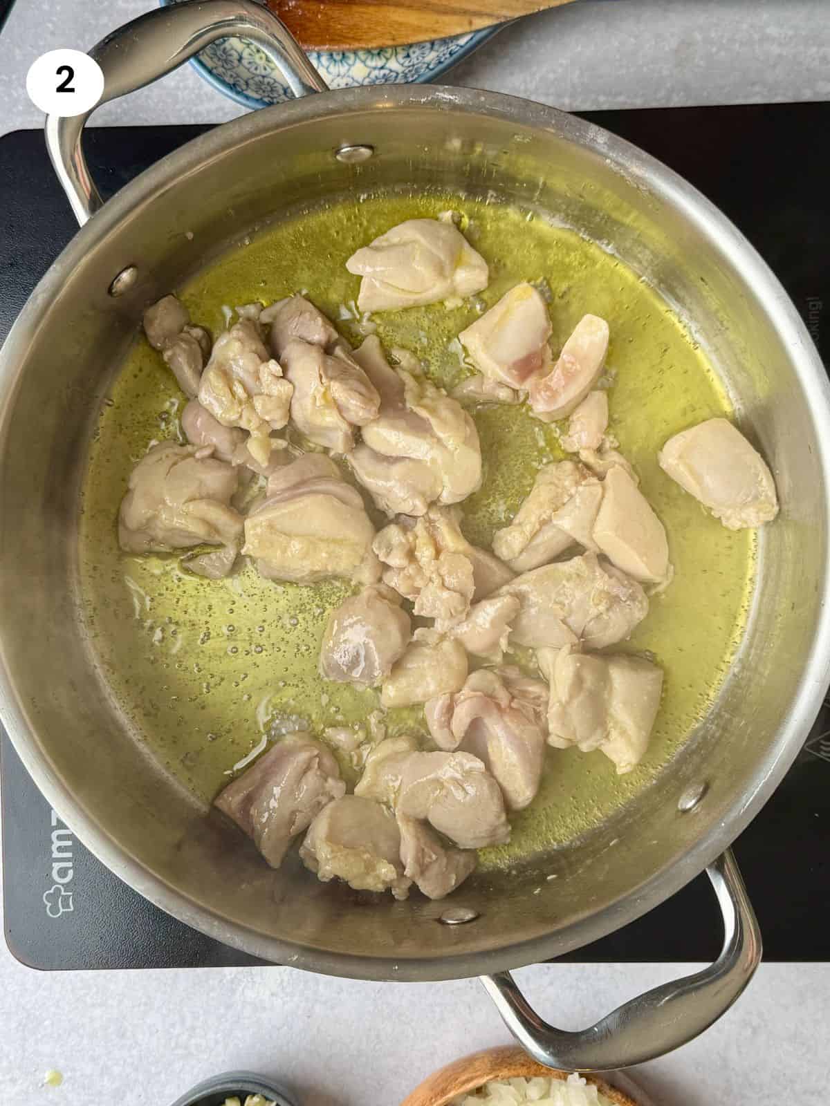 Browning the chicken before adding the other ingredients.