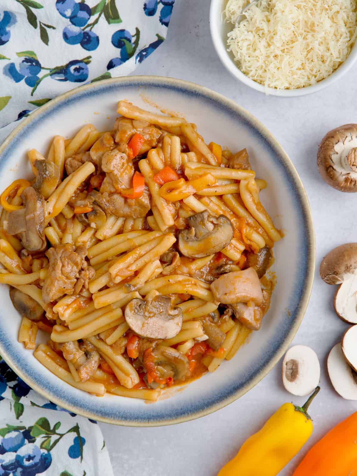 Chicken And Mushroom Pasta With Tomato Sauce.