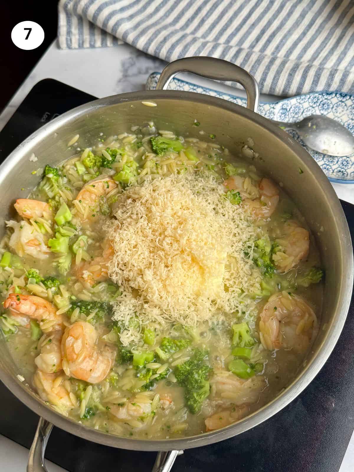 Adding the butter and parmesan.