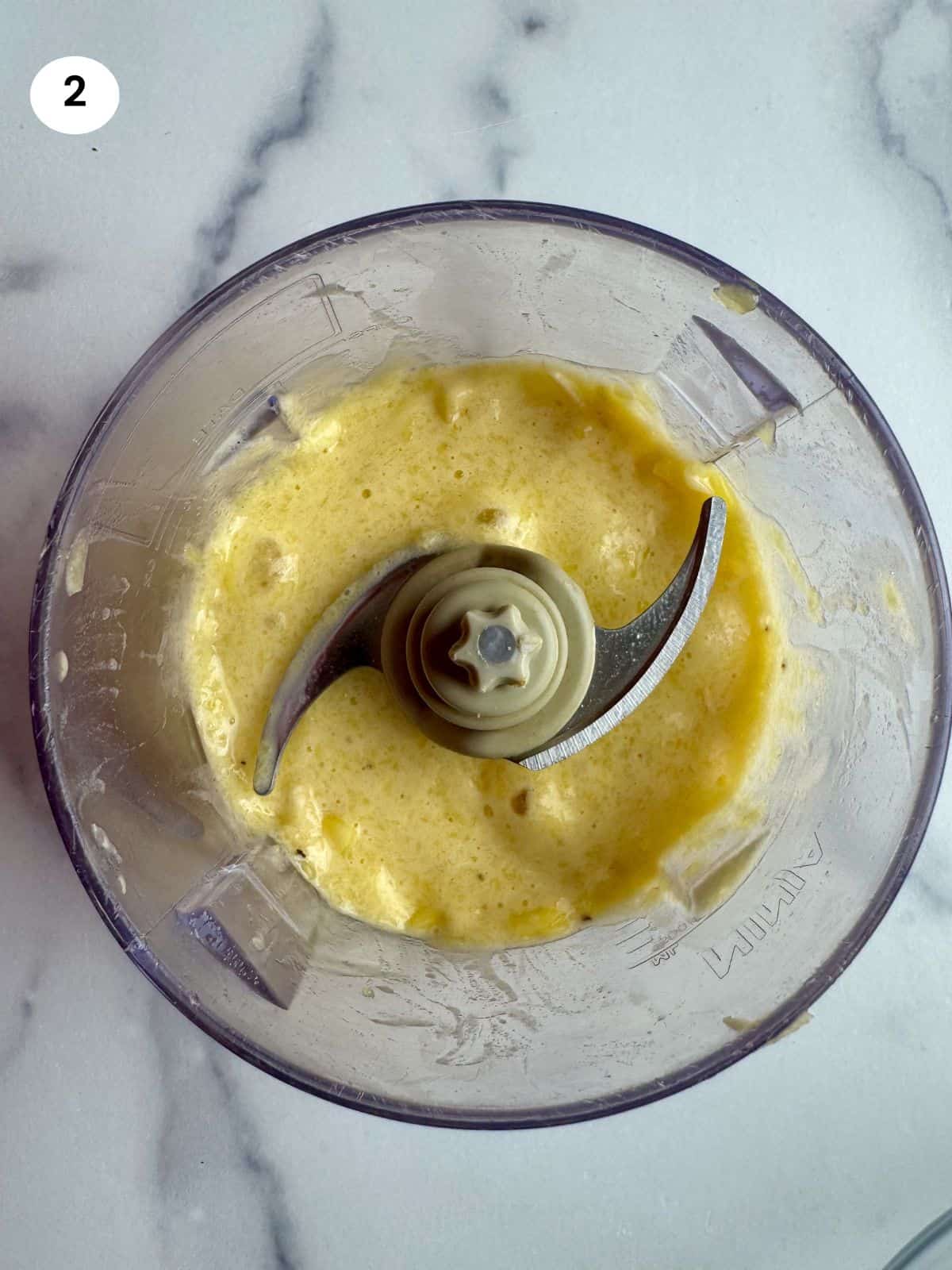 Mango and banana blended in a food processor.