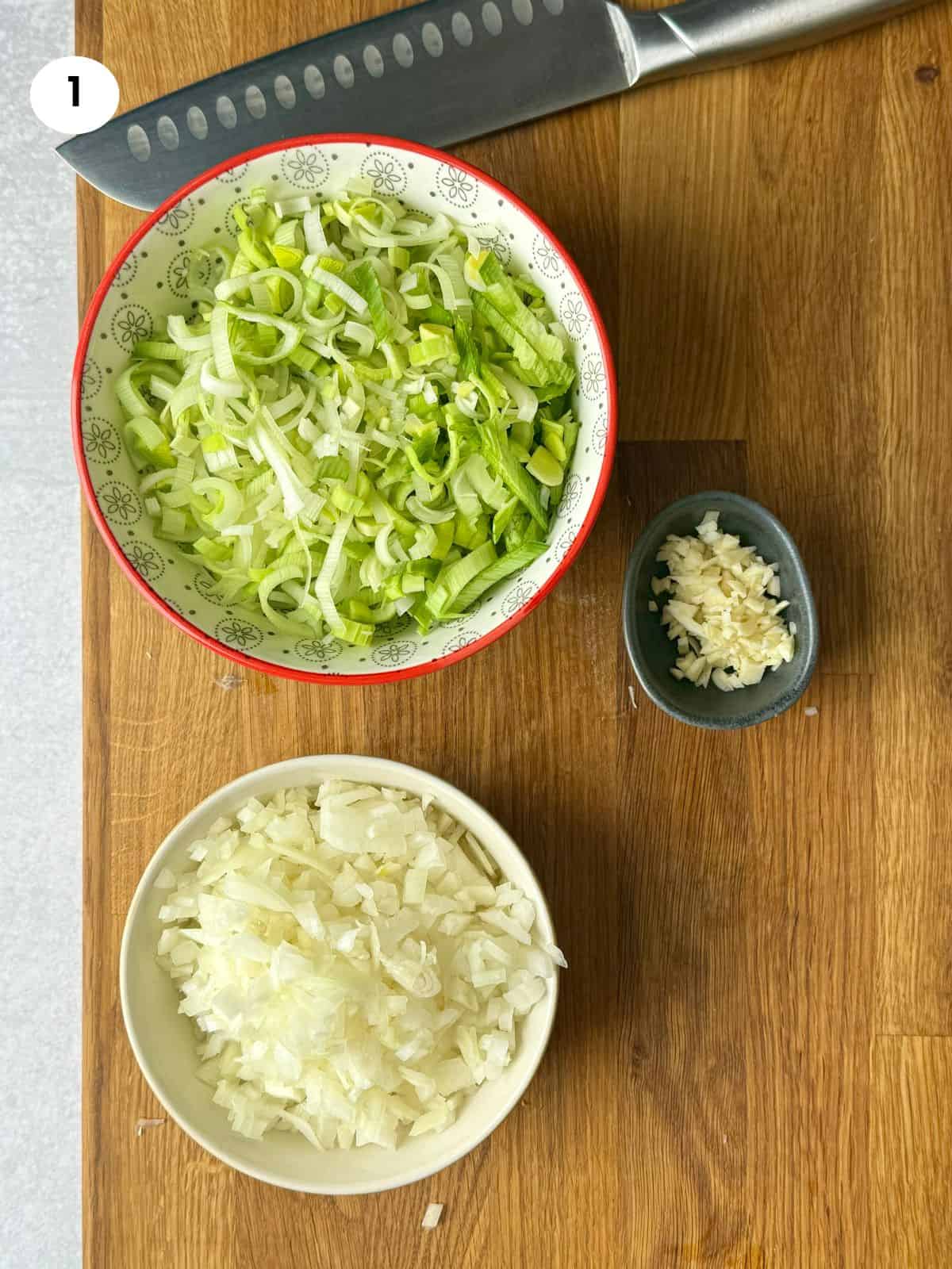 Chopped onion, garlic and leek ready for the stew.