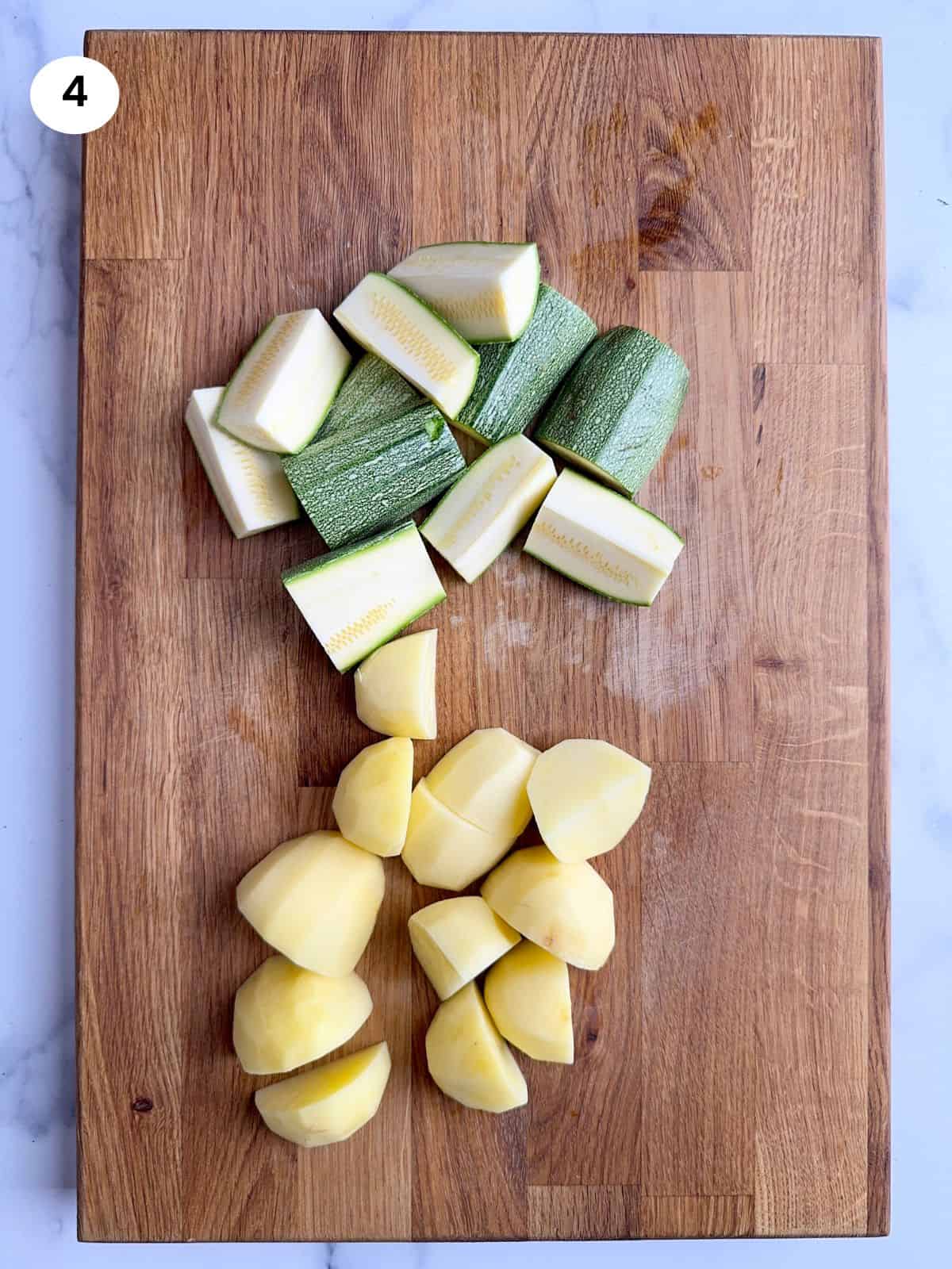 Cut potatoes and zucchini ready to be cooked.